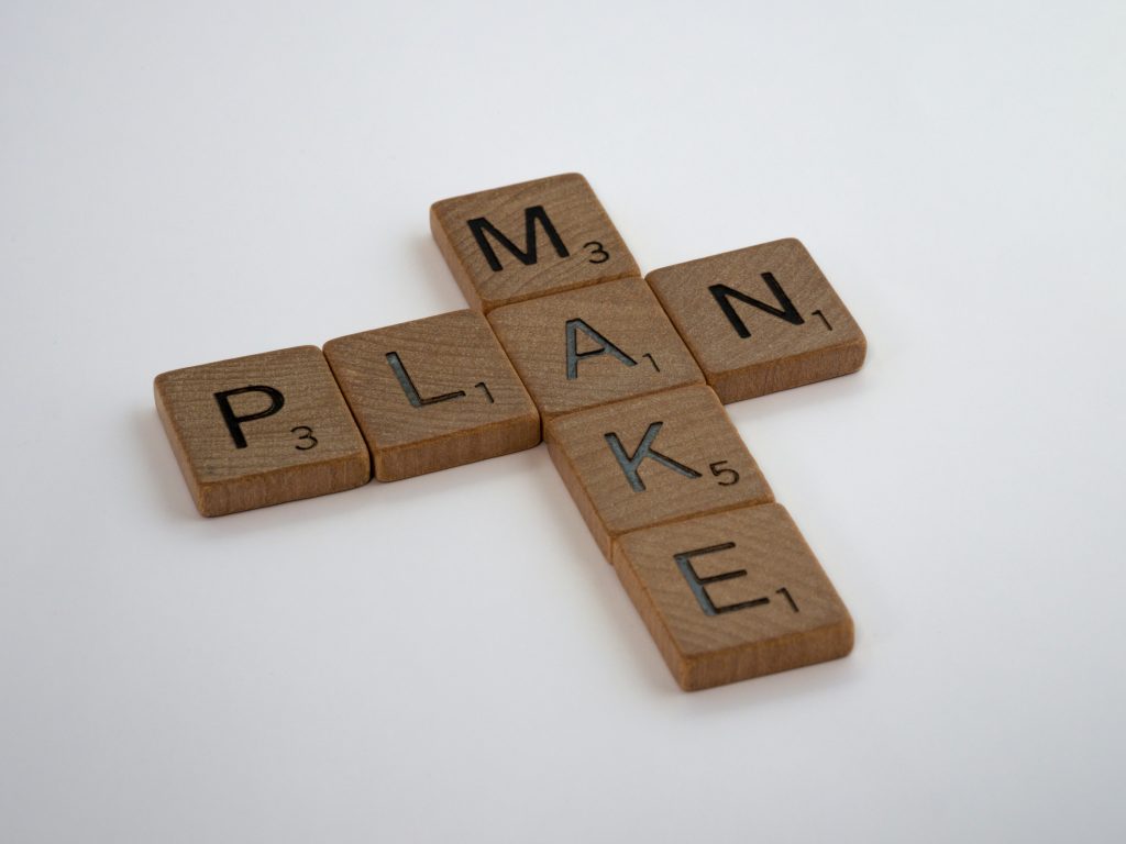 wooden planks with the text "make plan"